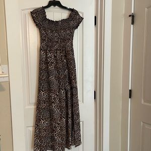 Ladies leopard shorts/skirted jumpsuit/romper. Size large.